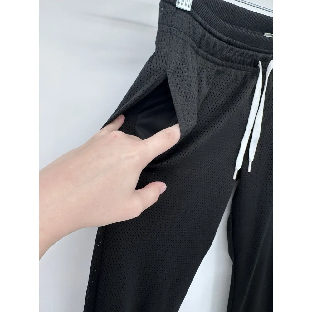 Nike girl M mesh lined snap side back logo flare pants athletic Y2K 90s preppy
